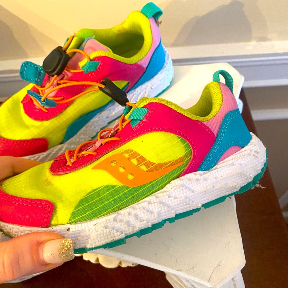 Girls Saucony multi colored tennis shoes. Worn less than 3x. Size 11